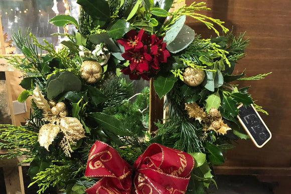 Christmas Wreath of greens and gold with red bow